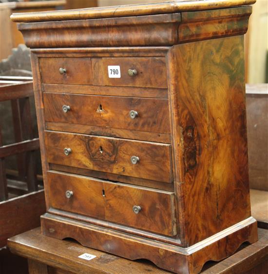 A Victorian miniature mahogany chest of two short and three long drawers, beneath a frieze drawer W.45cm
